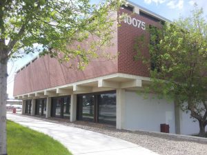 Business with reflective privacy window film