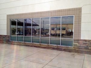 Business with window film for privacy and cooling