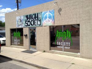 Dispensary dark window film and signage graphics