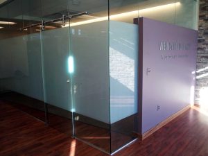 Glass office space with privacy window film