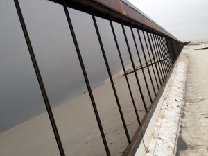 Rooftop reflective cooling and privacy window film